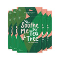 Four packets of FaceTory 2-step Soothe Me Tea Tree masks are stacked, featuring vibrant green packaging with leaf illustrations and white text. Infused with chamomile flower extract, these masks calm blemishes for a refreshed complexion.