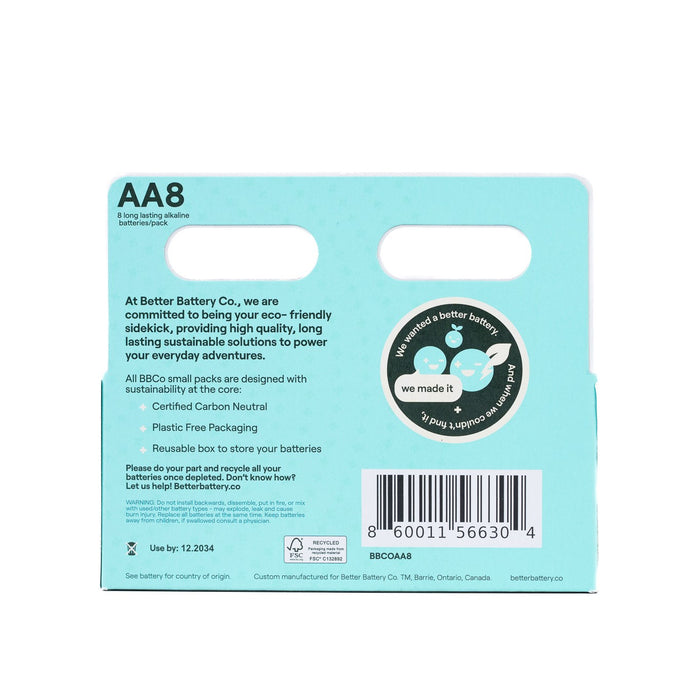 The back of a Better Battery Co AA Batteries pack—worlds first zero-waste, carbon-neutral alkaline batteries—features eco-friendly packaging, certification logos, a barcode, and two cut-out handles on a light blue background.