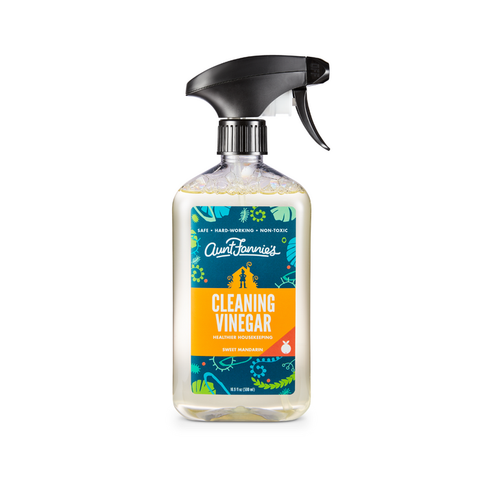 Aunt Fannies All-Purpose Cleaner in a spray bottle features a Sweet Mandarin scent with a blue and orange label design. It is non-toxic, made with essential oils and plant-based surfactants for effective cleaning results.