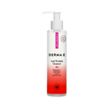 A bottle of Derma E Anti-Wrinkle Cleanser with a white pump, featuring powerful ingredients such as retinol and glycolic acid, comes in white and pink packaging labeled “Renews + Refines.”.
