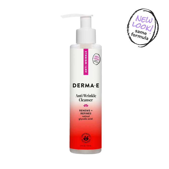 A bottle of Derma E Anti-Wrinkle Cleanser, featuring a white pump and red gradient label with “NEW LOOK! same formula” highlighted in a hand-drawn circle at the top right corner, contains powerful ingredients like retinol to rejuvenate your skin.
