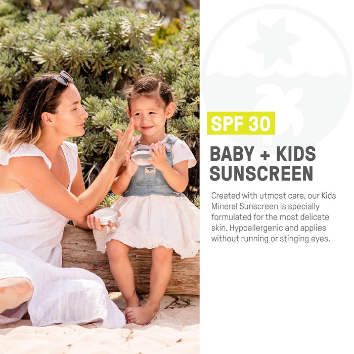 A woman gently applies Raw Elements Baby + Kids Lotion Tin SPF 30 to a smiling child sitting on a wooden log outdoors. The image highlights its gentle protection, broad-spectrum UVA-UVB coverage, and hypoallergenic formula that avoids stinging sensitive eyes.