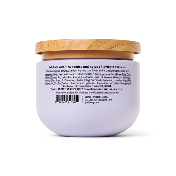 A light purple Pacha Soap Co. Body Scrub jar with a wooden lid features a back label with directions, ingredients, barcode, caution, and contact info. The gentle scrub exfoliates with pumice and has lavandin and mint notes.
