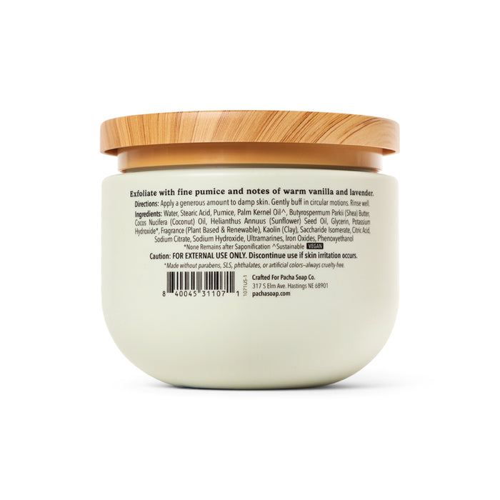 A white jar with a wooden lid and back label shows directions, ingredients, warnings, and barcode for Pacha Soap Co. Body Scrub—a gentle scrub with creamy whipped texture for face and body.