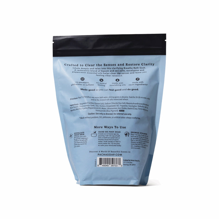 A blue stand-up pouch of Pacha Soap Co. Breathe Salt Soak, displayed from the back with product info, usage instructions, and branding in black text. The pouch has a resealable black top and is set against a white background.