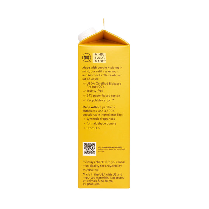 The Honest Companys Bubble Bath, Carton Refill boasts a yellow carton highlighting its eco-friendly traits: USDA certified biobased materials, cruelty-free, recyclable packaging, tear-free formula, and absence of certain synthetic ingredients for a gentle experience.