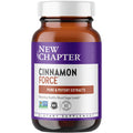 A brown bottle of New Chapter Cinnamon Force Healthy Blood Sugar Level dietary supplement features a purple and white label and delivers potent, non-GMO cinnamon vegetarian capsules to support healthy blood sugar levels.