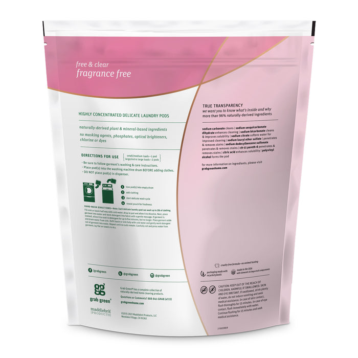 The back of the grab green Delicate Laundry Detergent Pods pouch features free & clear fragrance-free text, with washing instructions, machine usage diagrams, and emphasizes natural ingredients made with advanced green chemistry. The pink and white design includes logos at the bottom.