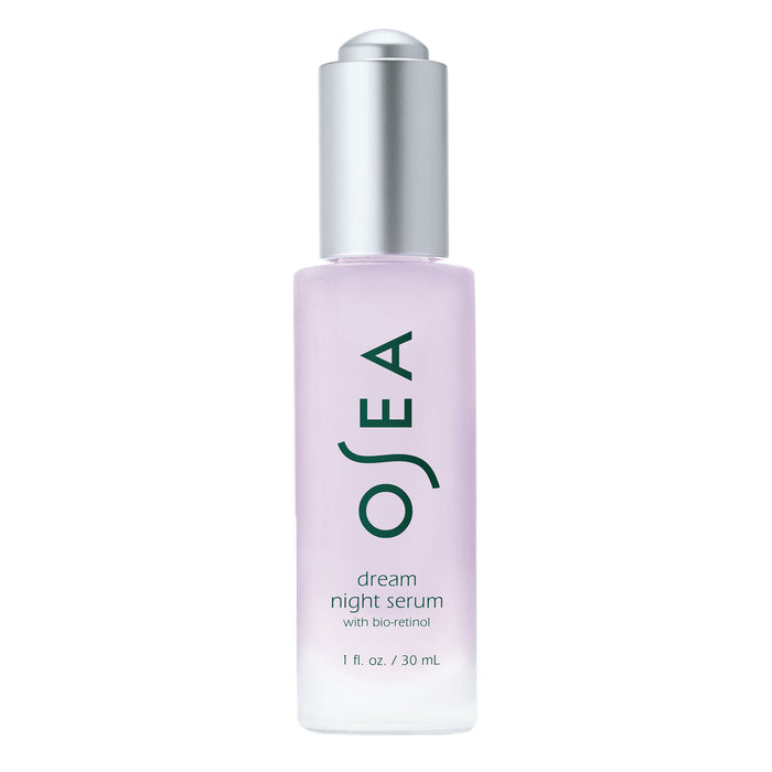 A frosted glass bottle of OSEA Dream Night Serum with a silver cap, holding 1 fl oz (30 mL) of lavender bio-retinol serum. The label reads “OSEA Dream Night Serum with firming peptides.”.