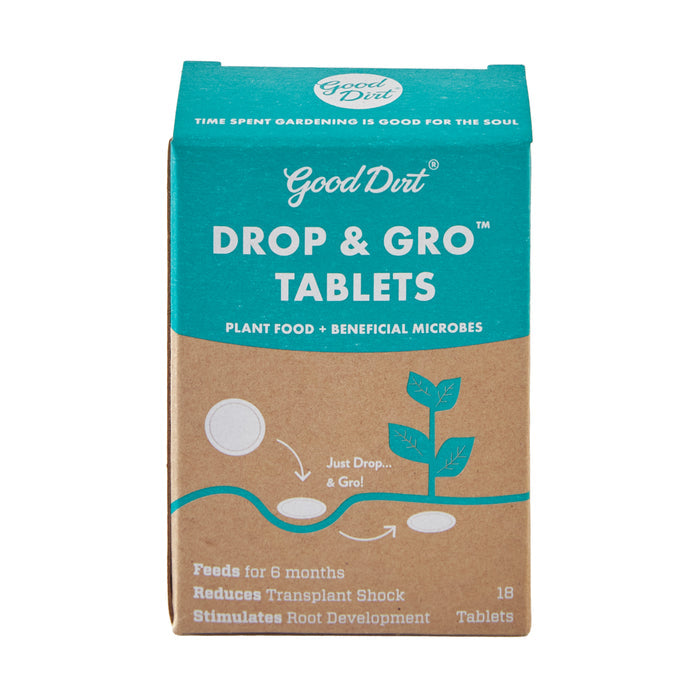 The teal and brown Good Dirt Drop & Gro Tablets box includes 18 tablets of plant food with beneficial microbes, enhancing soil health, reducing transplant shock, boosting plant establishment, and providing nourishment for 6 months.