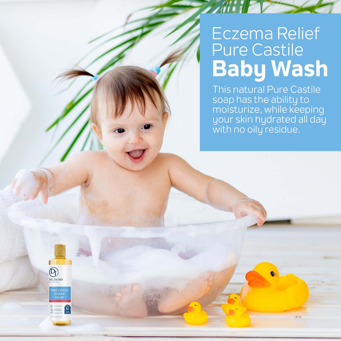 A smiling baby sits in a clear tub filled with bubbles, playing with yellow rubber ducks. Nearby is a bottle of Dr Jacobs Naturals Eczema Relief Baby Wash, featuring its hypoallergenic formula. Highlights include hydration and antioxidant-rich olive and coconut oil without leaving an oily residue.