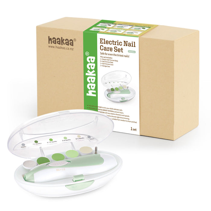 The Haakaa Electric Nail Care Set, featuring a polar bear motif, offers gentle nail care with a green and white trimmer. The packaging showcases the product name and images of the tool, and it includes interchangeable heads in a transparent case.