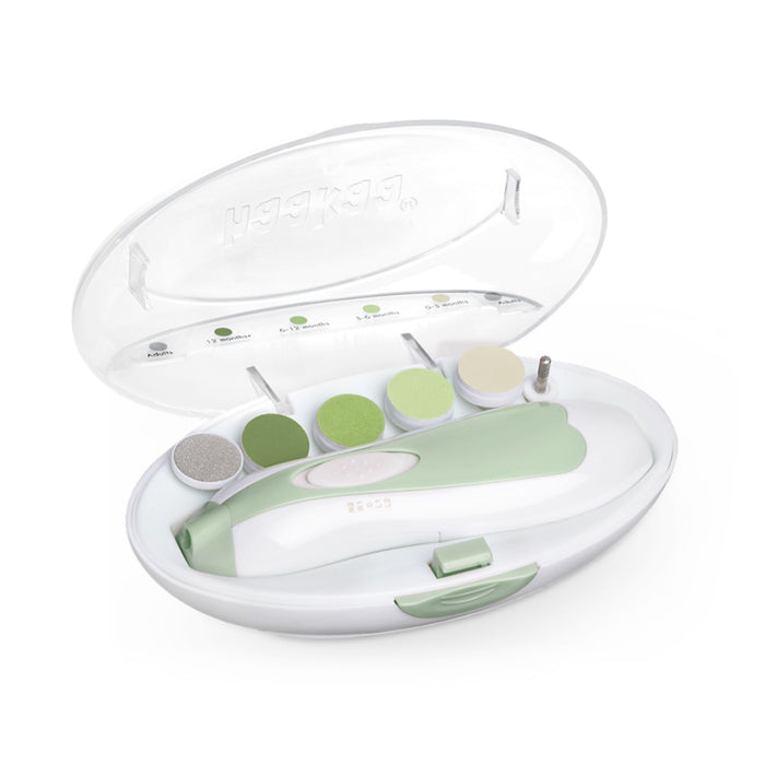The Haakaa Electric Nail Care Set is compact and features a light green and white design with a polar bear motif in an open plastic case. It comes with labeled circular attachments for gentle nail care, all secured by a front lock clasp.
