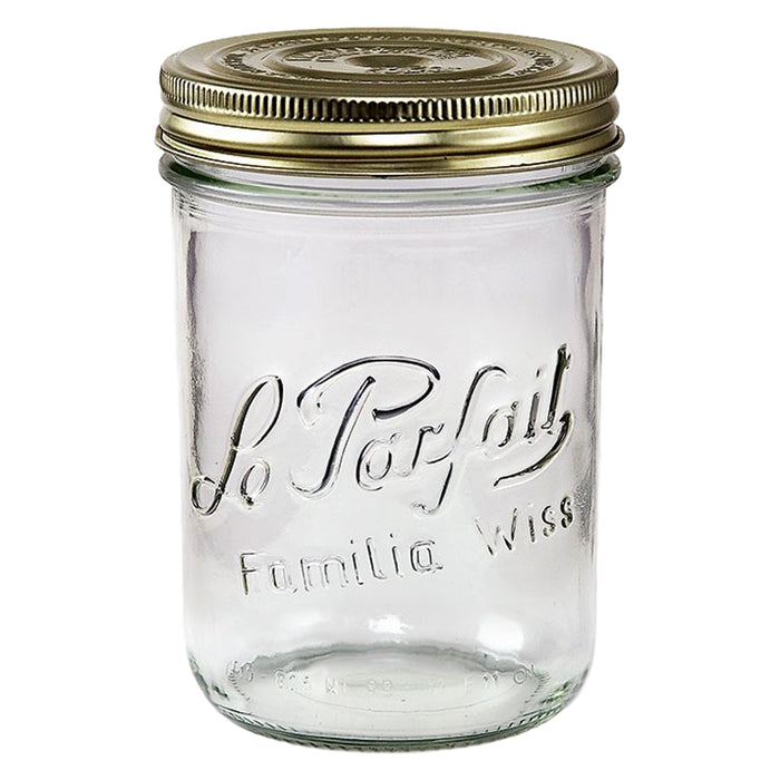 The Le Parfait French Mason Canning Glass Jar, 750ml, features a gold metal lid with embossed Le Parfait Familia Wiss, ensuring an airtight seal for preserves. This empty jar eagerly awaits its next culinary adventure.