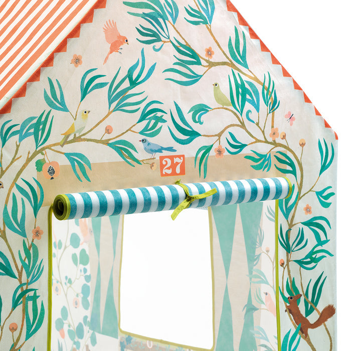 The DJECO Garden Tent Play House features a charming floral and bird design with green and orange accents. An arched doorway and striped window frame make it perfect for imaginative play, and the number 27 above the window invites kids to explore their creative hideout.