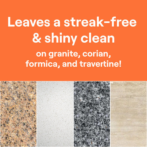 Text on orange background reads: Seventh Generation Granite & Stone Cleaner leaves granite, corian, formica & travertine streak-free and shiny. This non-toxic cleaner has a refreshing mandarin-orange scent, with close-up surface samples shown below.
