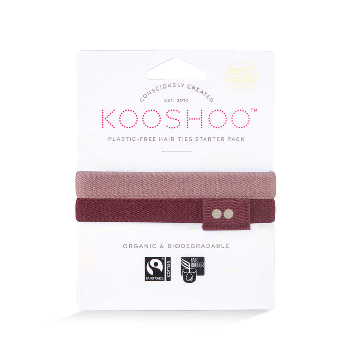 Two maroon KOOSHOO Hair Ties from the Wild Plum Sampler, shown on white packaging labeled Organic & Biodegradable Hair Ties Starter Pack, with Fairtrade and biodegradable icons highlighting these zero waste hair ties.