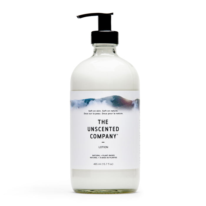 A minimalist clear pump bottle of The Unscented Companys Hand and Body Lotion, labeled with 465 ml (15.7 fl oz), showcases a natural, vegan formula with plant-based ingredients for a light, gentle texture on the skin.