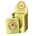 A yellow box labeled Wooden Spoon Herbs Lemon Ginger Immune Toddy - Sachets contains immune support packets, each featuring brown text and a flower illustration.