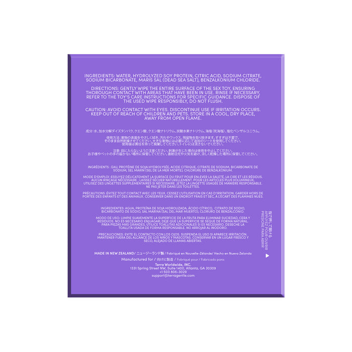 A purple Terra Initimate Toy Cleaning Wipes box, with white text showing ingredients, directions, and cautions in several languages, is photographed against a white background. The wipes are individually wrapped.