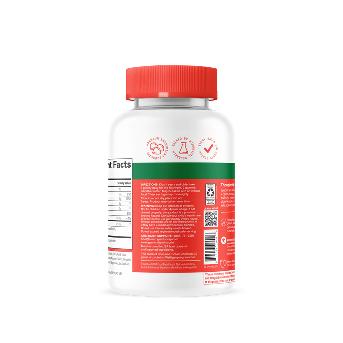 A white bottle with a red cap is displayed, featuring the SmartyPants Kids Fiber + Veggie Gummies. The red label showcases icons, text, a QR code, and partially visible nutrition facts on the left side. Emphasizing its unique formula, this children’s fiber supplement includes an organic veggie blend for enhanced nutritional support. Directions and supplement information appear in white text on the label.