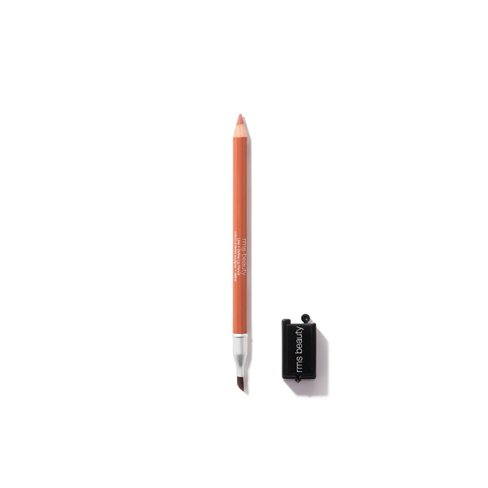 A creamy, richly pigmented RMS Beauty Lip Pencil in brown sits elegantly on a white background with a sharpener beside it.