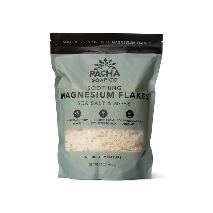 Pacha Soap Co. Salt Soak comes in a 32-ounce resealable bag with a green and white design and clear window. The mineral-rich Magnesium Flakes in Sea Salt & Moss are perfect for a soothing bath soak.