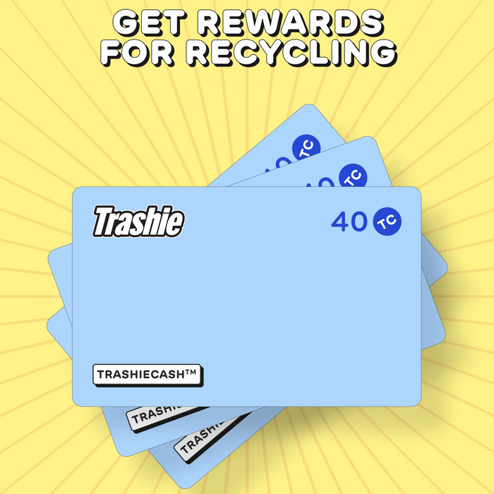 A yellow radial background highlights blue Trashie cards with 40 TC in the top corner. The caption reads, Earn rewards for recycling with the Medium Tech Take Back Box.