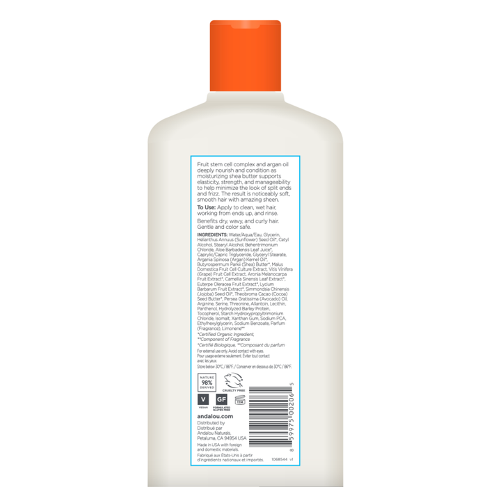 A shampoo bottle featuring a white label with an orange cap displays Andalou Naturals Moisture Rich Argan Oil & Shea Conditioner. The label provides product details, ingredients, and instructions in fine print. The bottle stands upright against a plain white background.
