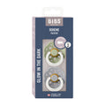 The BIBS Natural Latex Rubber Glow in the Dark Pacifier, Size 2 (6-18 Months), includes two pacifiers in muted green and beige. Made from natural rubber, they feature glow-in-the-dark designs and Danish-made quality to support breastfeeding effectively.