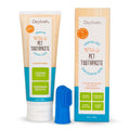 A tube of Oxyfresh Pet Dental Gel + Fingerbrush Kit is shown next to its box and a blue fingerbrush. The packaging promotes dental care for dogs and cats—cleansing teeth, removing plaque, freshening breath, and being flavor-free.