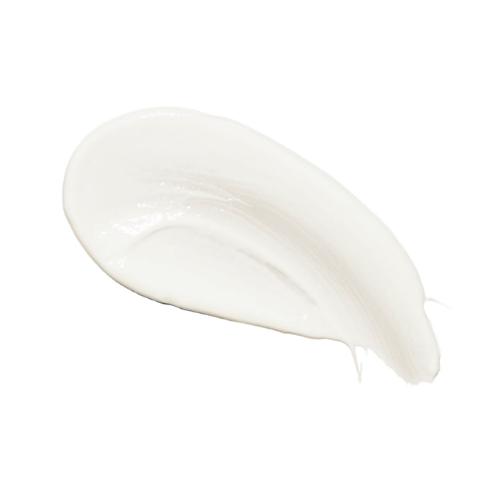 A smooth, creamy white swipe of FRÉ Skincare PROTECT BODY 100% Mineral Sunscreen SPF 50 is shown on a plain white background.