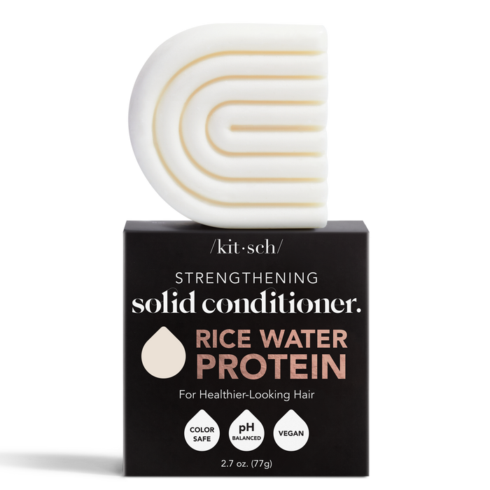 Kitschs Rice Water Protein Conditioner Bar, labeled Strengthening Solid Conditioner, includes rice water for healthier-looking, voluminous hair. It is color-safe, pH-balanced, and vegan.