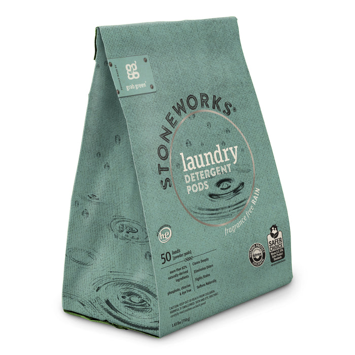 A teal bag of grab greens Stoneworks Laundry Detergent Pods - Rain contains 50 scent-free pods for deep cleaning. The packaging features water droplets and eco-friendly certifications, including the EPA Safer Choice Certified label.