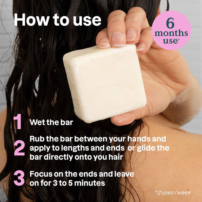 A person with wet dark hair holds ATTITUDE’s super leaves Conditioner Hydrating bar. Instructions explain this vegan, plastic-free conditioner should be left on for 3–5 minutes. Text notes it lasts up to 6 months.