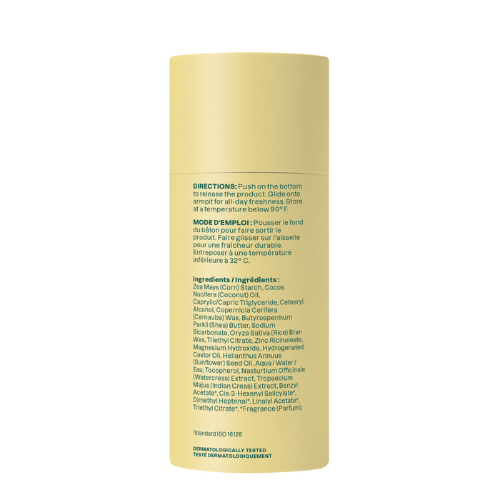 A yellow cylindrical container with black text gives directions in English and French, lists ingredients, and notes the vegan super leaves Deodorant by ATTITUDE is dermatologically tested and aluminum-free, with no visible branding.
