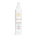 A white bottle of Innersense Organic Beautys Sweet Spirit Leave-In Conditioner, featuring a sunburst logo and a spray nozzle, is infused with Certified Organic plant extracts and elegantly set against a plain white backdrop.
